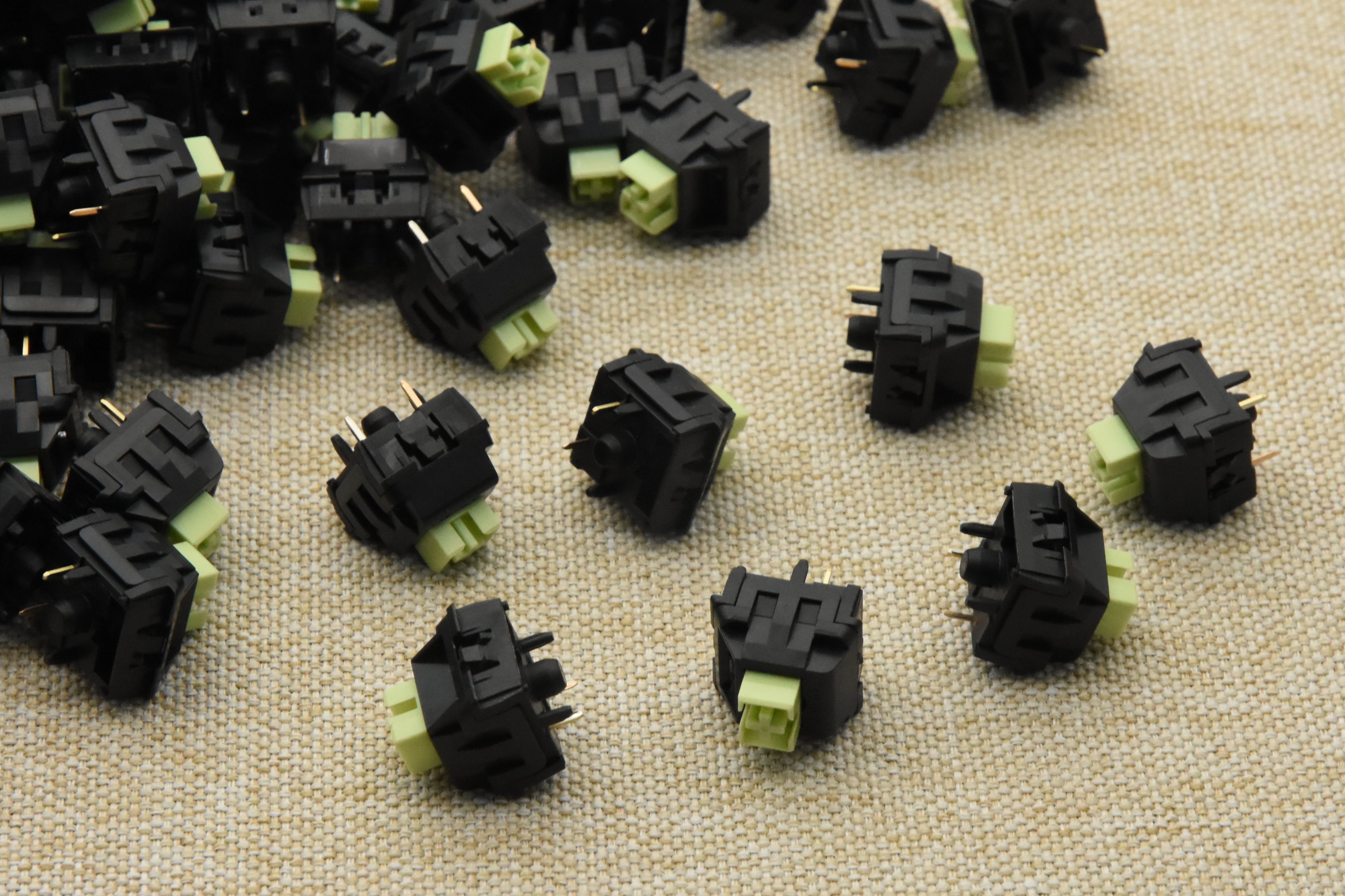 WEKT XCJZ GREEN MUSTARD W LINEAR SWITCH FACTORY LUBED (10 PCS)