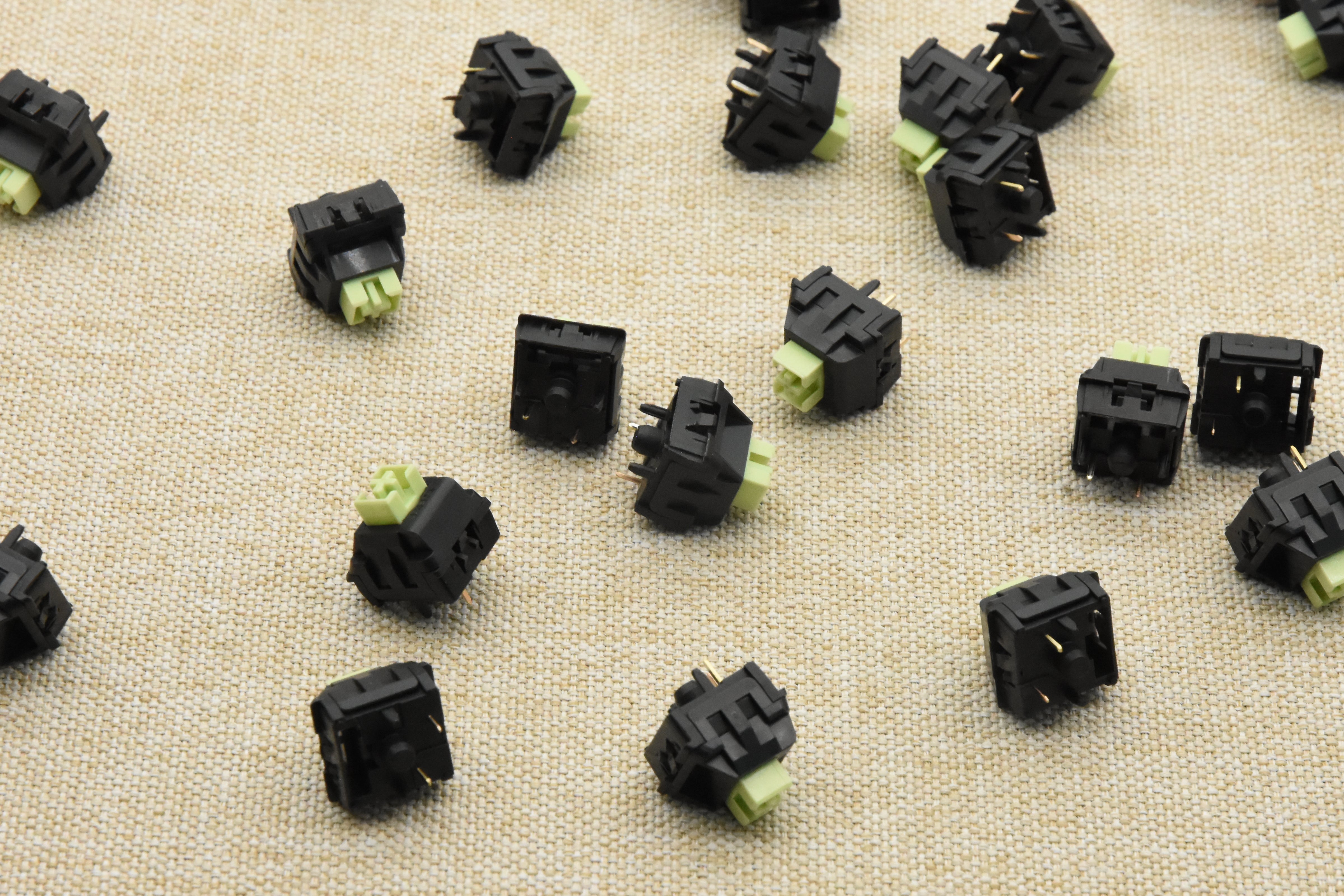 WEKT XCJZ GREEN MUSTARD W LINEAR SWITCH FACTORY LUBED (10 PCS)