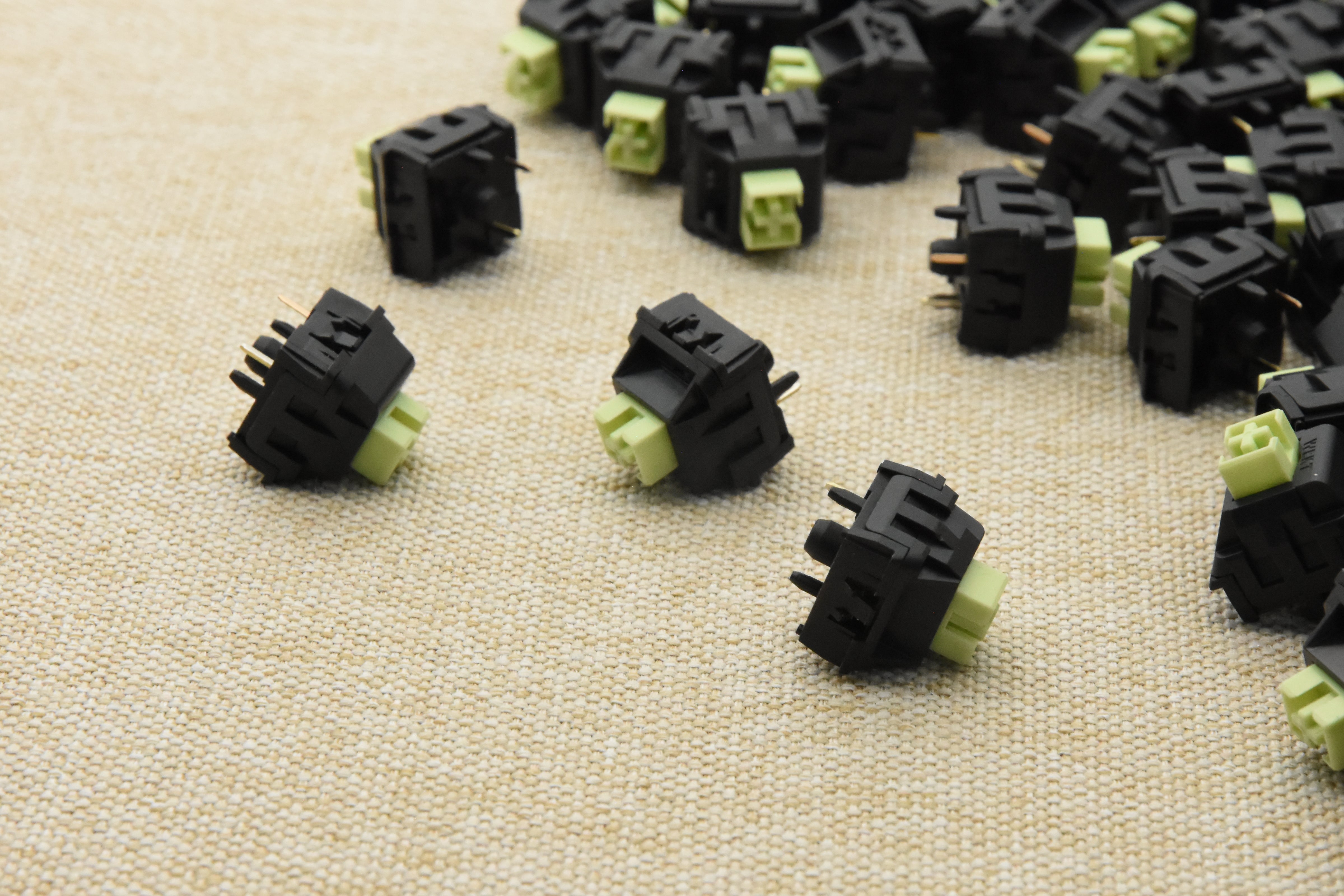 WEKT XCJZ GREEN MUSTARD W LINEAR SWITCH FACTORY LUBED (10 PCS)