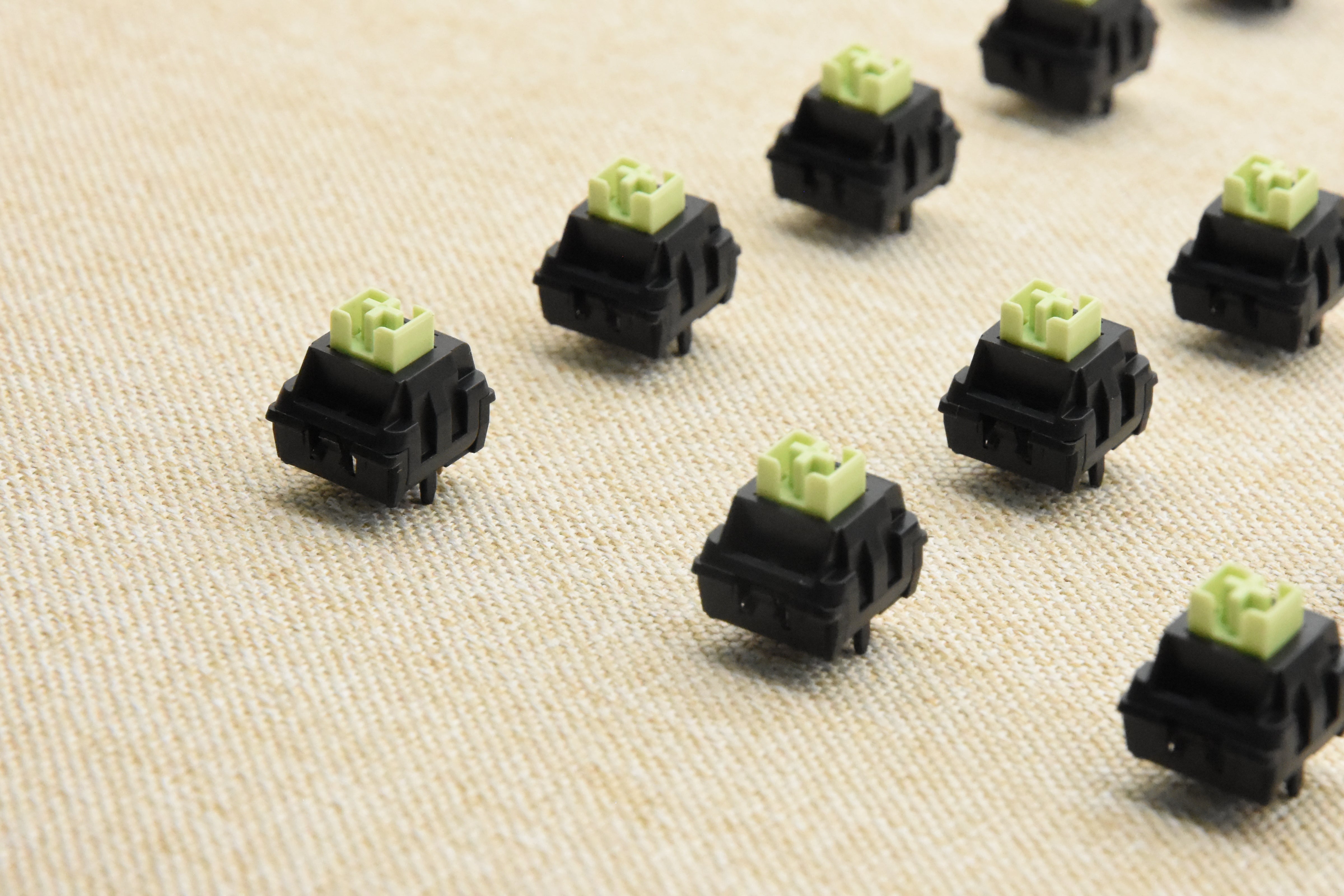 WEKT XCJZ GREEN MUSTARD W LINEAR SWITCH FACTORY LUBED (10 PCS)