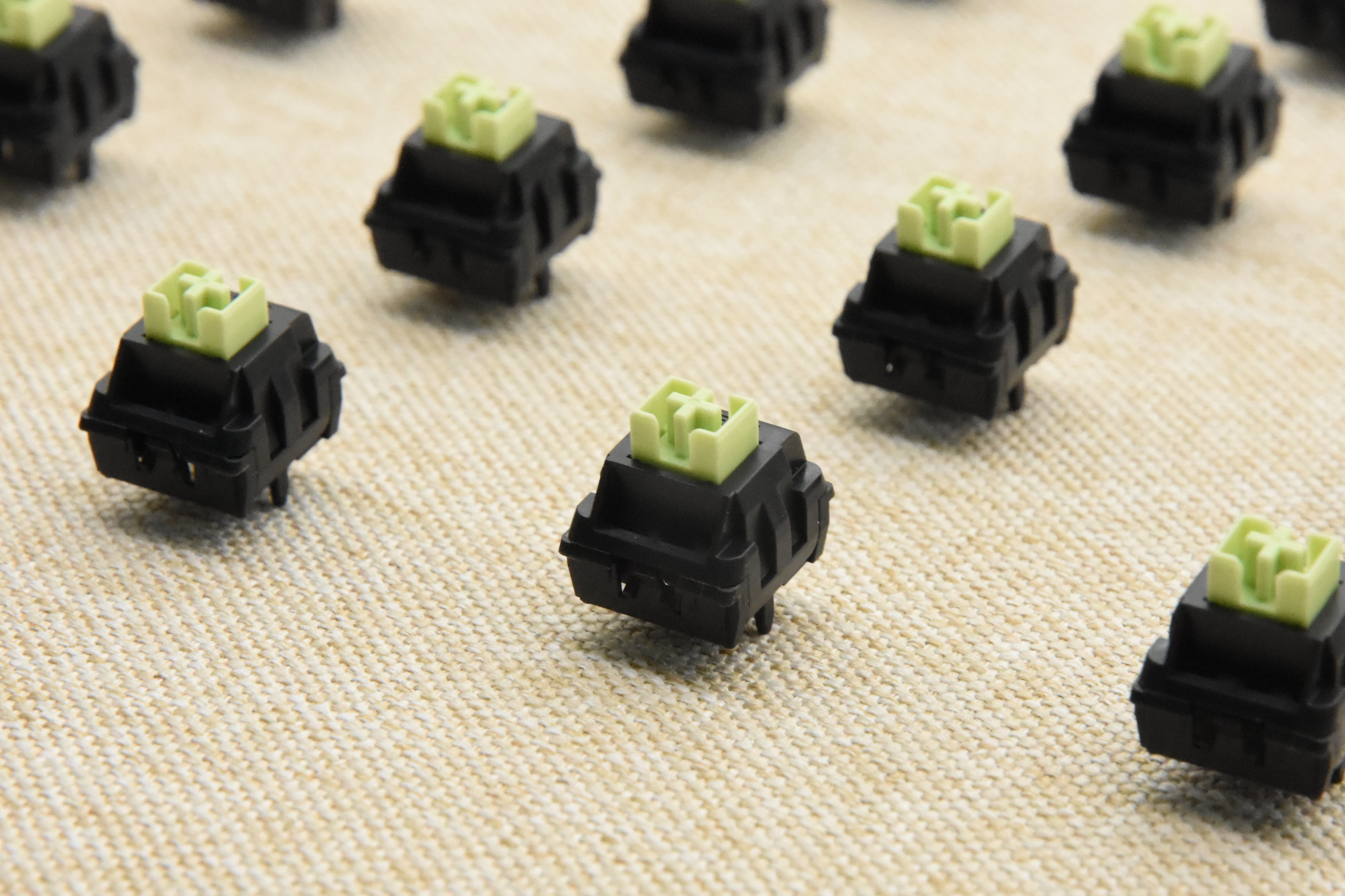 WEKT XCJZ GREEN MUSTARD W LINEAR SWITCH FACTORY LUBED (10 PCS)