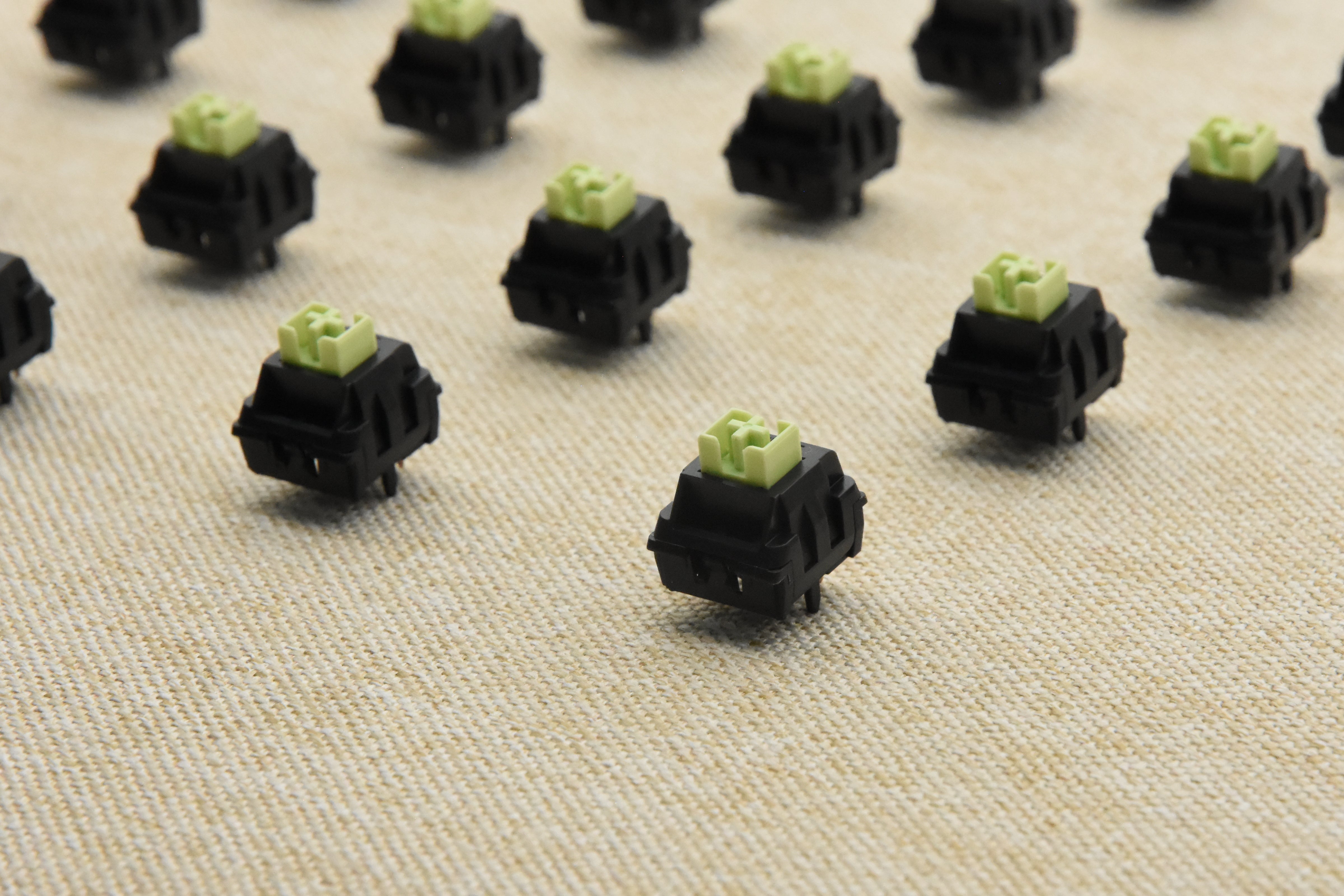 WEKT XCJZ GREEN MUSTARD W LINEAR SWITCH FACTORY LUBED (10 PCS)