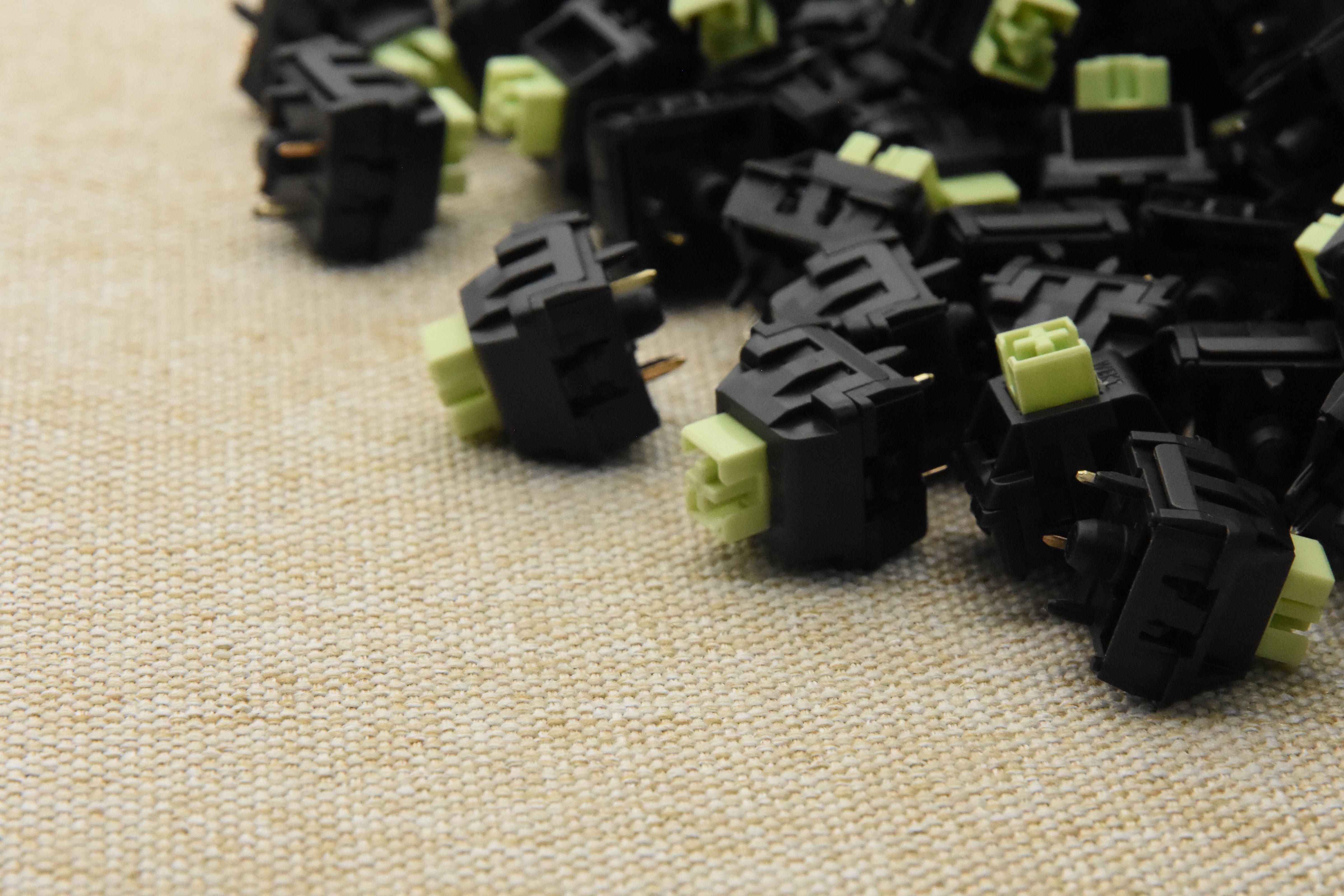 WEKT XCJZ GREEN MUSTARD W LINEAR SWITCH FACTORY LUBED (10 PCS)